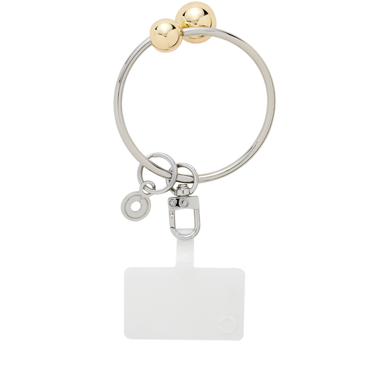 Big O Bracelet in quicksilver with gold ends by Oventure. Can attach phone or keys