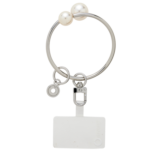 A Trendy phone bracelet for handsfree convenience in silver with pearls.