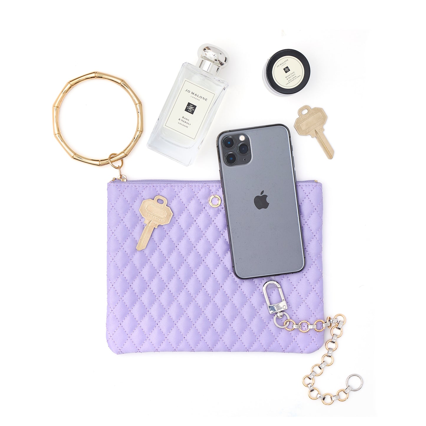 Quilted lavender bracelet bag for hands-free style.