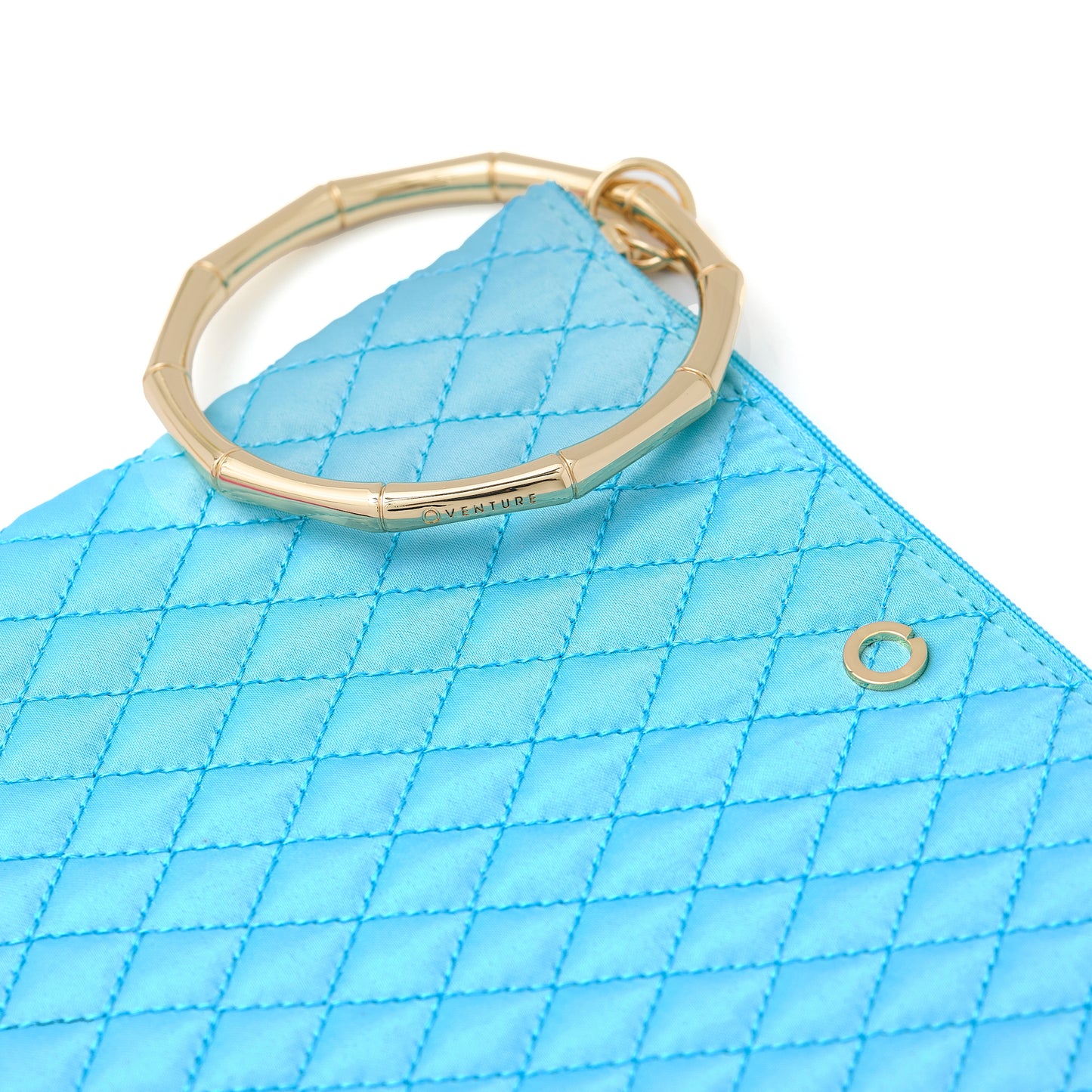 Stylish aqua quilted bracelet bag for everyday wear