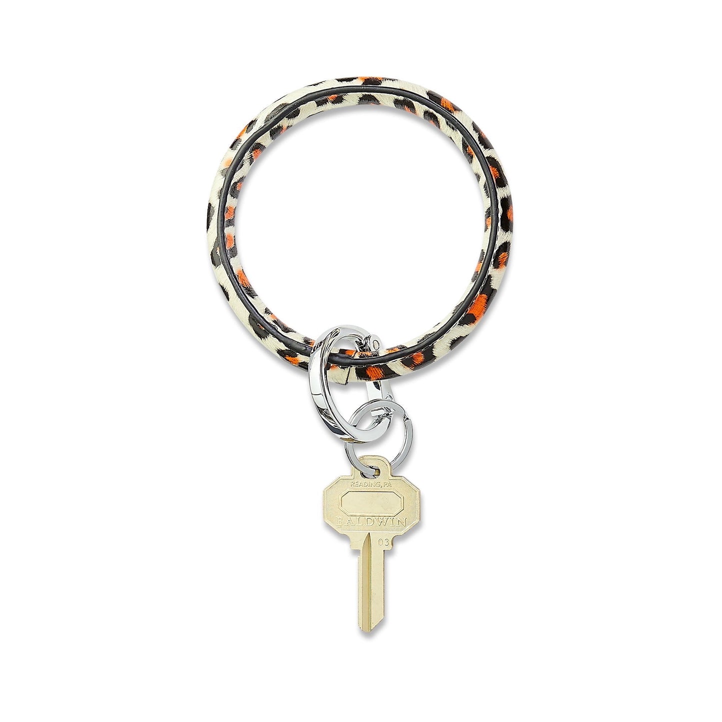 Oventure leather key ring in cheetah print. This leather key chain is shown with silver split ring and key attached.