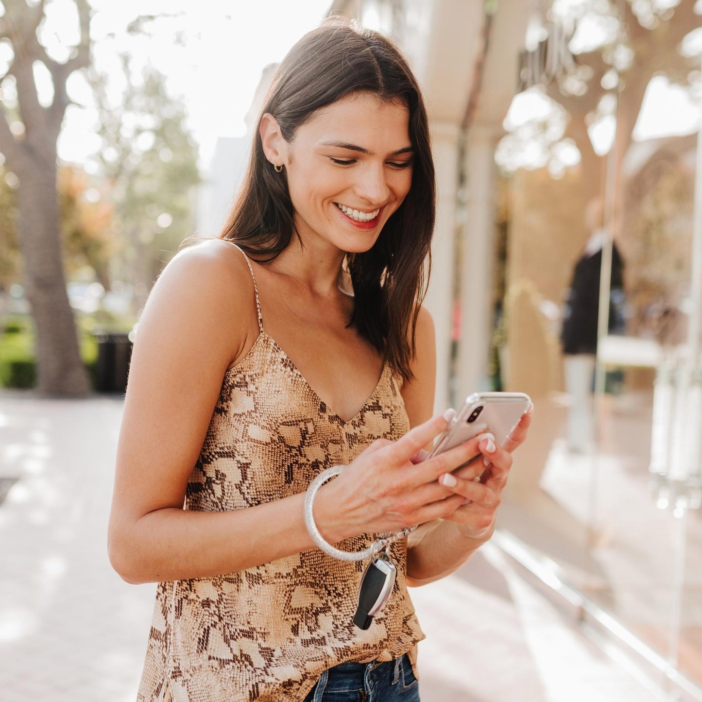 Disco Ball - Resin Big O Key Ring - Oventure shown with key fob attached and hook me up phone connector