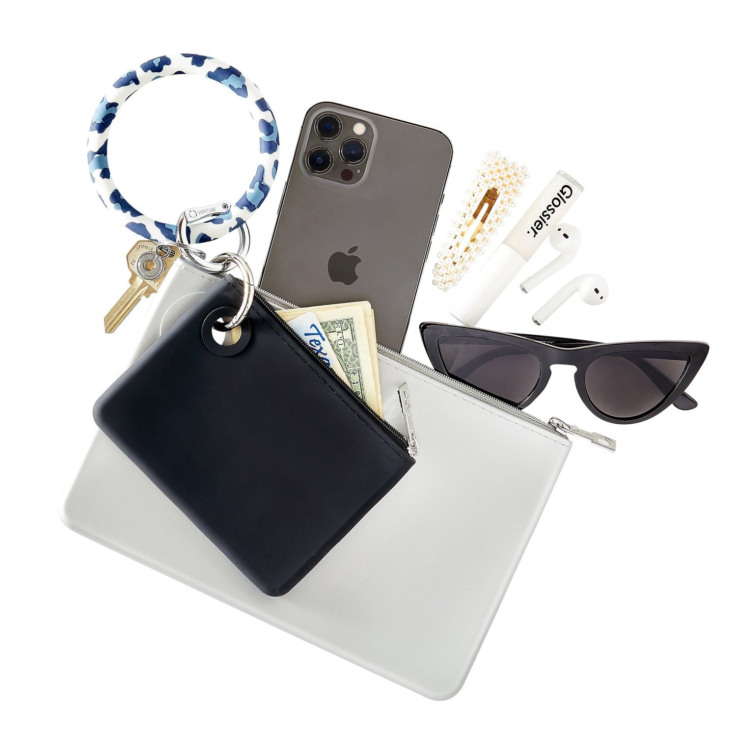 Navy Leopard - Silicone Big O Key Ring - Oventure attached to a mini silicone pouch in black and a large silicone pouch in silver