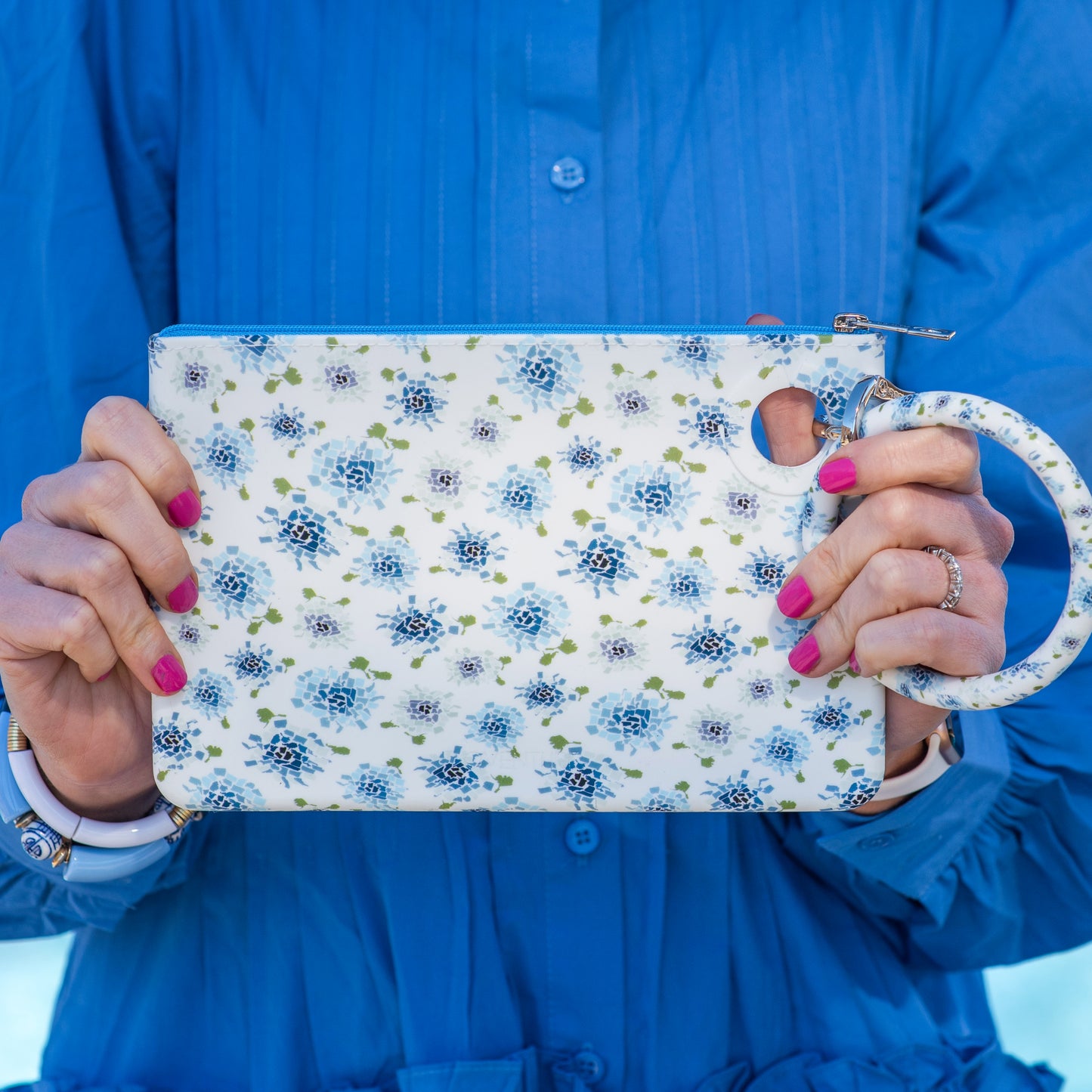 Blue floral silicone large pouch for essentials storage.