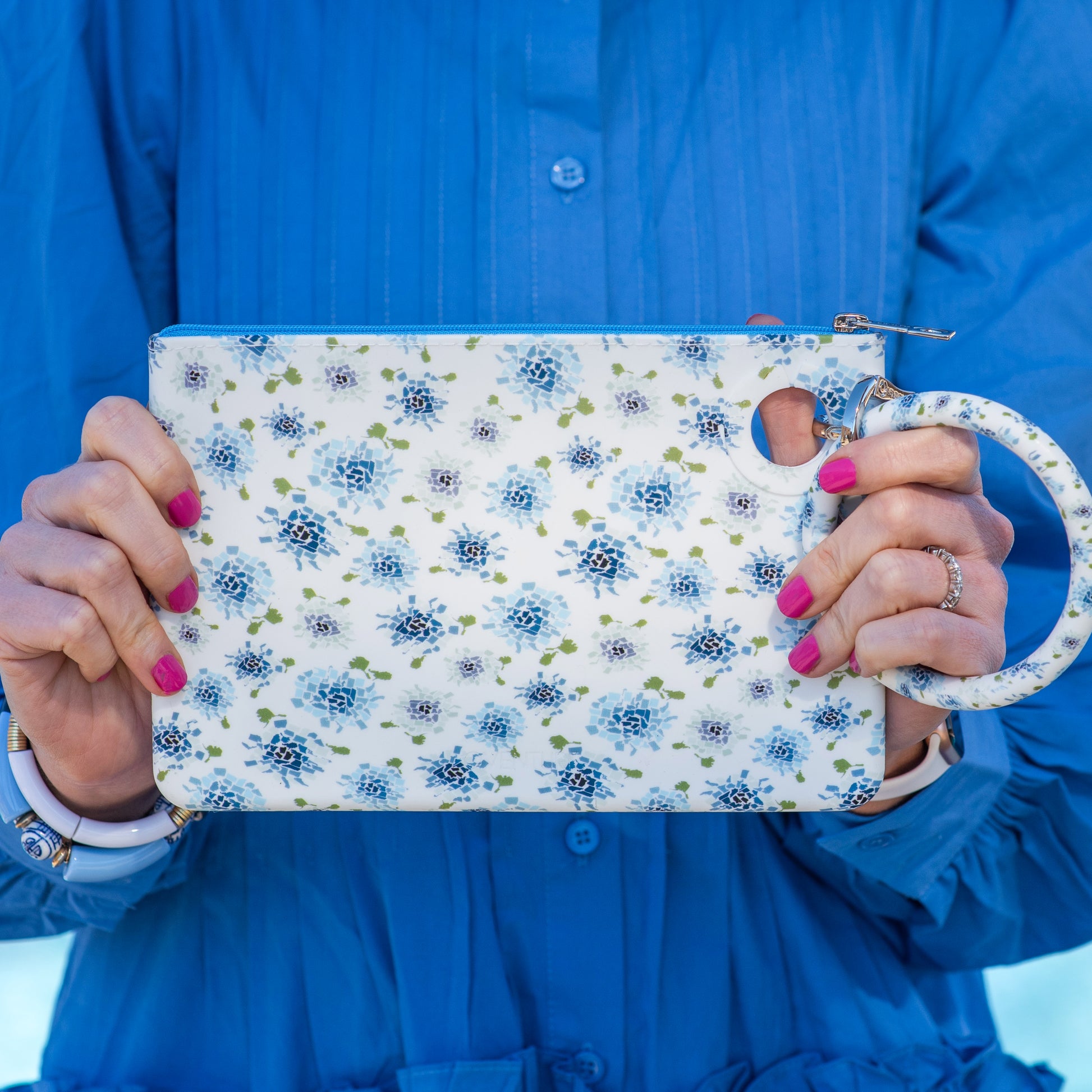 Blue floral silicone large pouch for essentials storage.