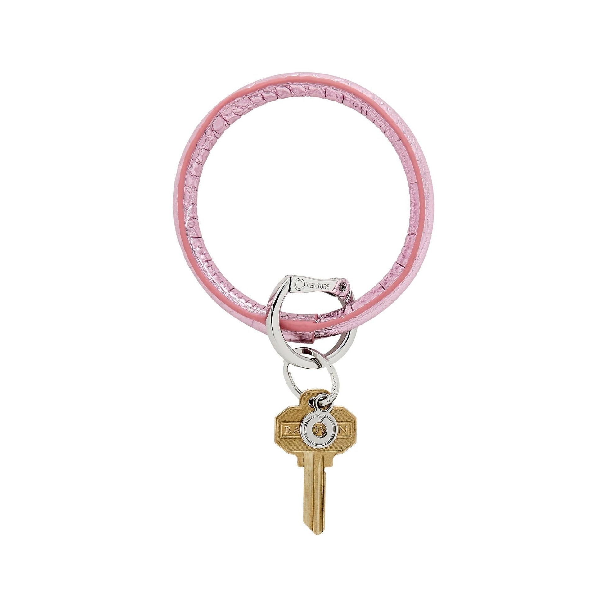 Metallic Pink Leather Croc Embossed Big O Key Ring with silver locking clasp shown on wrist