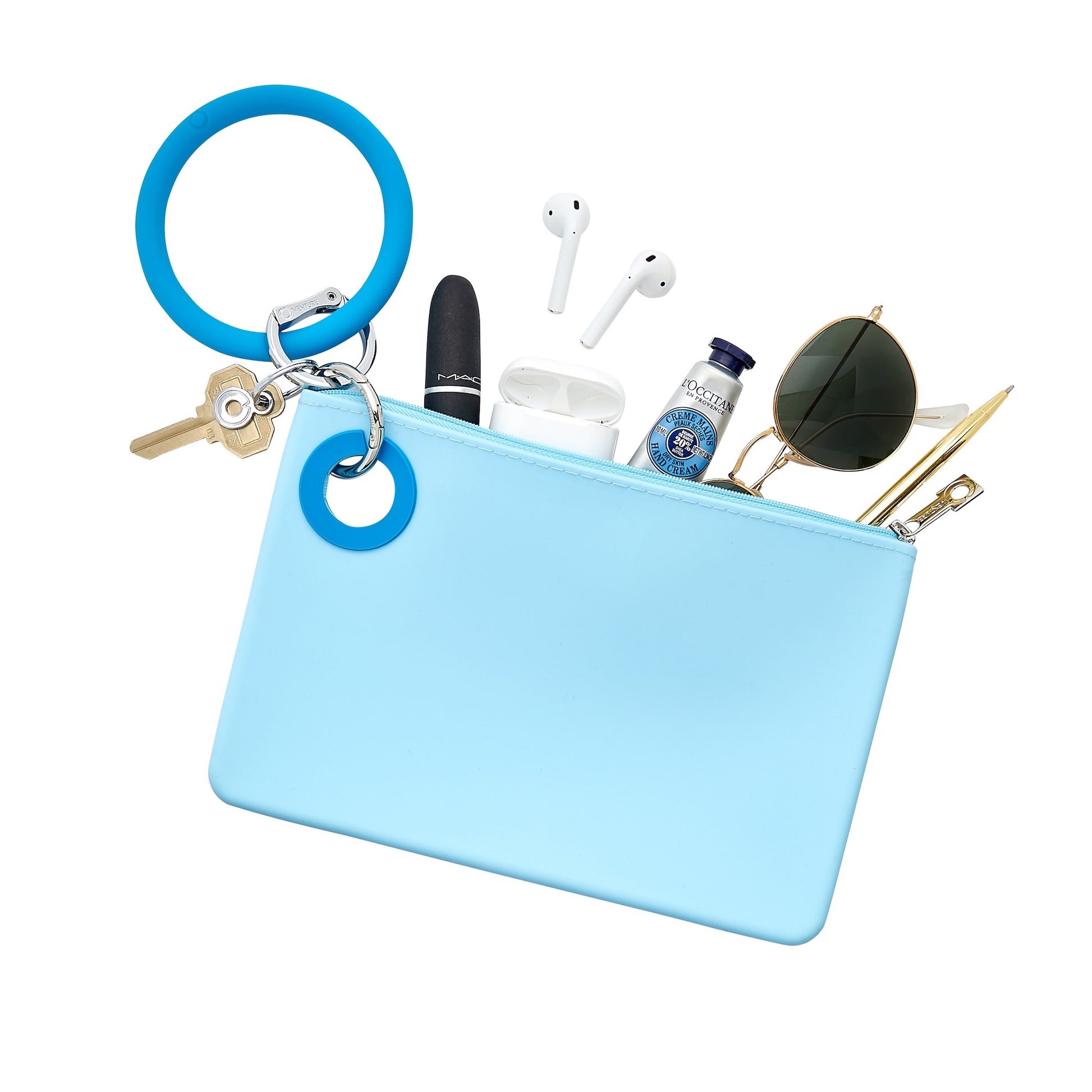 Durable and chic large pouch in Carolina Blue - shown holding lipstick, ear pods, sunglasses and hand cream. This large pouch has a big o key ring attached in peacock silicone.