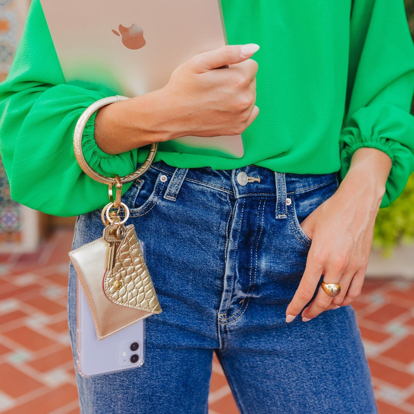 Luxe gold wallet wristlet with phone holder.