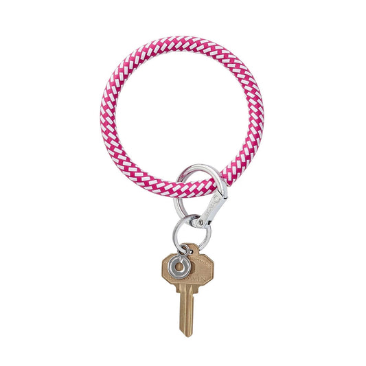 The Tickled Pink Riviera Big O® Key Ring features hot pink and white woven leather, inspired by chic Parisian bistro chairs. Stylish, durable, and hands-free.
