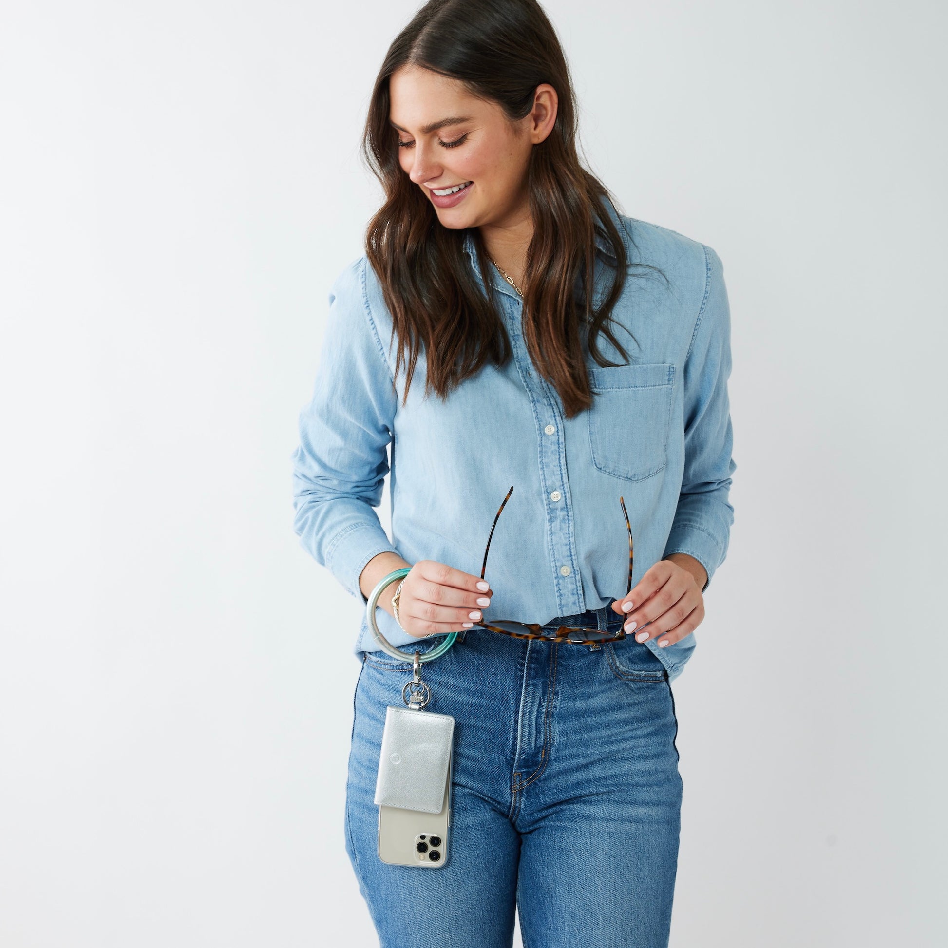 Luxe leather ID case keychain wallet with Big O Key Ring and phone charm attached
