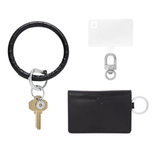 Black wristlet wallet with convenient phone holder.  This set comes with a key ring bracelet, id case and phone holder.