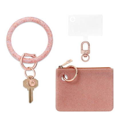 Rose Gold 3 in 1 set includes Silicone Big O Key Ring in Rose Gold Confetti, Mini Pouch in Rose Gold Confetti and Phone Connector in Rose gold