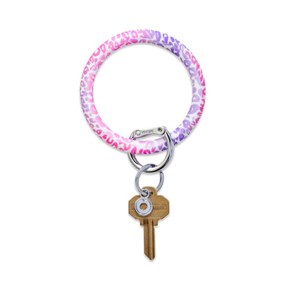 Shades of pink and purple cheetah print silicone big O key ring with silver locking clasp