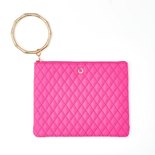 Tickled Pink Quilted Bracelet Pouch with gold bamboo bracelet attached.