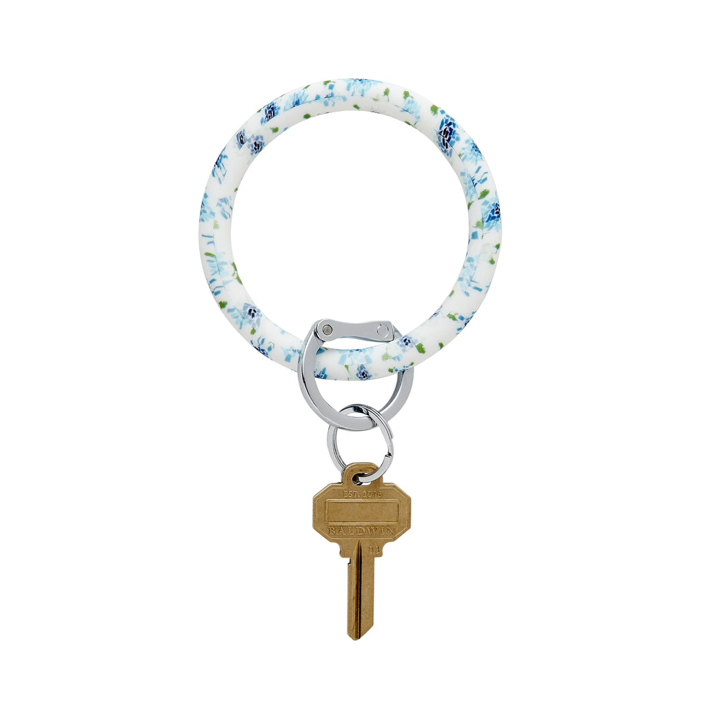 Big O Key Ring in Blue hydrangea print made up of the fifty states shapes on white background.