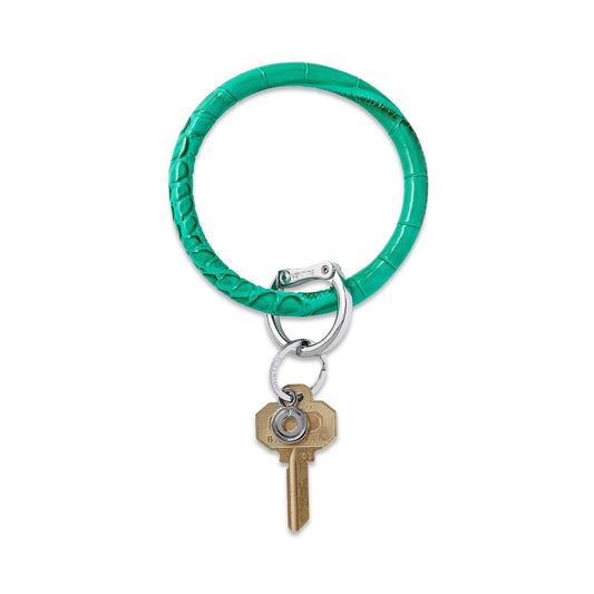 Big O Key Ring in Emerald Croc Embossed leather.  Beautiful Kelly green color with silver Oventure locking clasp.
