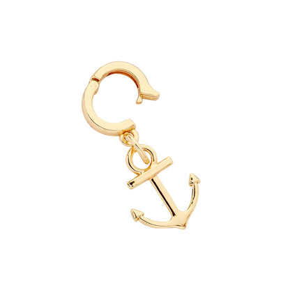 A gold-colored anchor charm with a secure huggie closure, designed to clip onto accessories like bracelets or wristlets.
