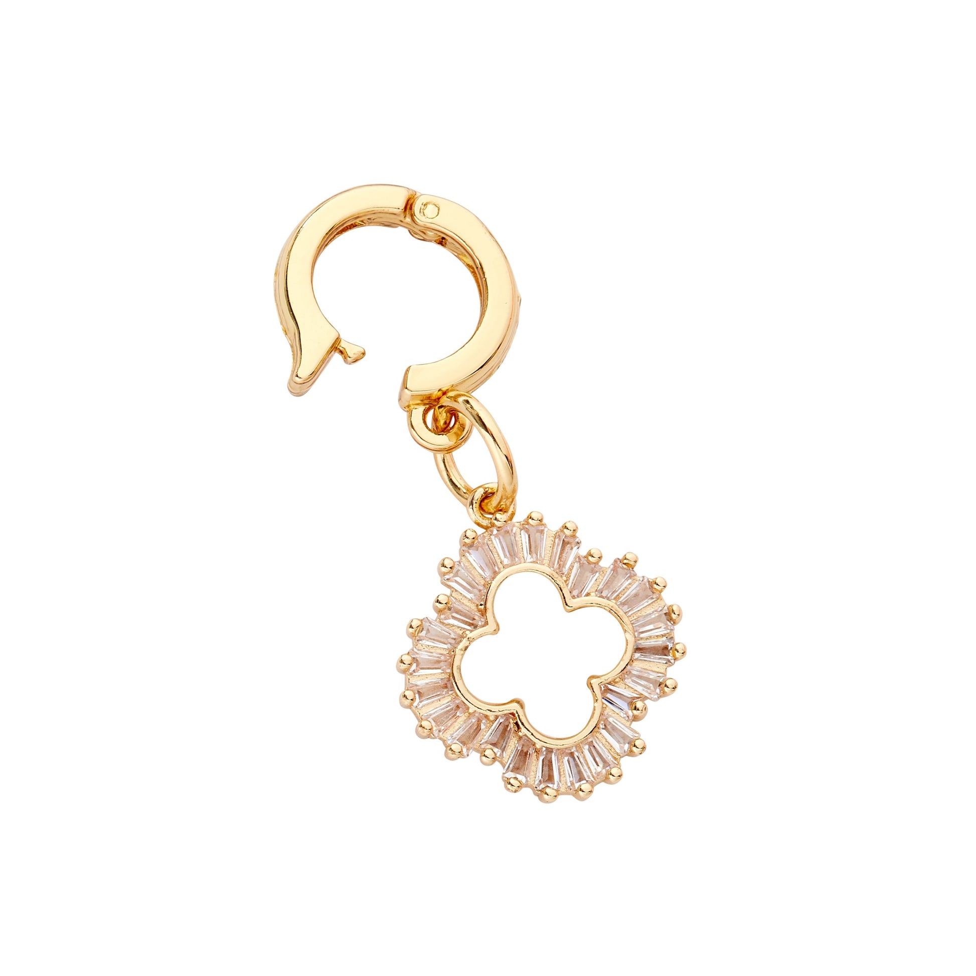 A gold-colored huggie-style charm with a mother of pearl design insert, isolated on a white background.