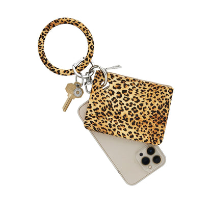 3-in-1 Cheetah Mini Silicone Pouch Set - Oventure contains a big o key ring in cheetah print silicone with a mini silicone wallet in cheetah print and a phone connector with silver hardware.