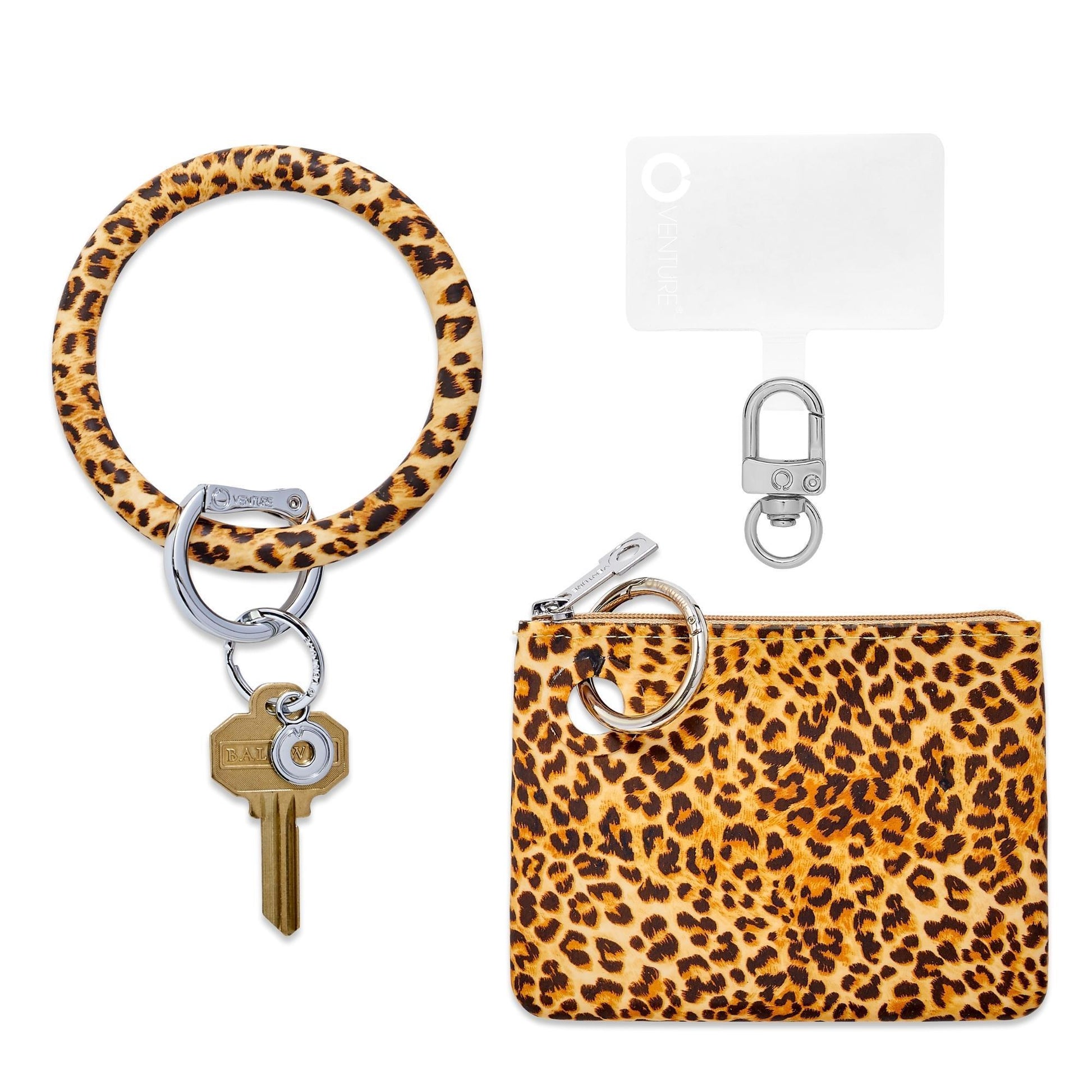 3-in-1 Cheetah Mini Silicone Pouch Set - Oventure contains a big o key ring in cheetah print silicone with a mini silicone wallet in cheetah print and a phone connector with silver hardware