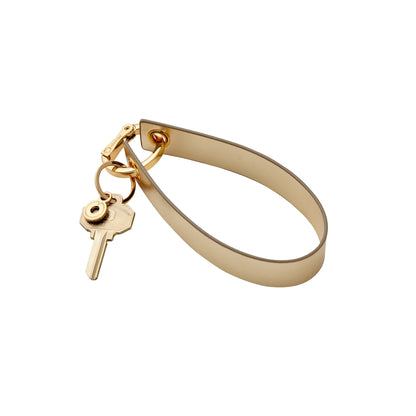 Stylish gold leather wristlet keychain accessory loop.