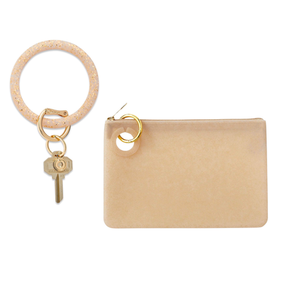 A sleek large pouch wristlet for organization in best selling gold glitter.