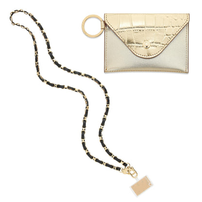 Gold Leather Crossbody Set - Oventure. This set includes a mini envelope wallet in gold leather and a crossbody chain I gold link with black leather intertwined.
