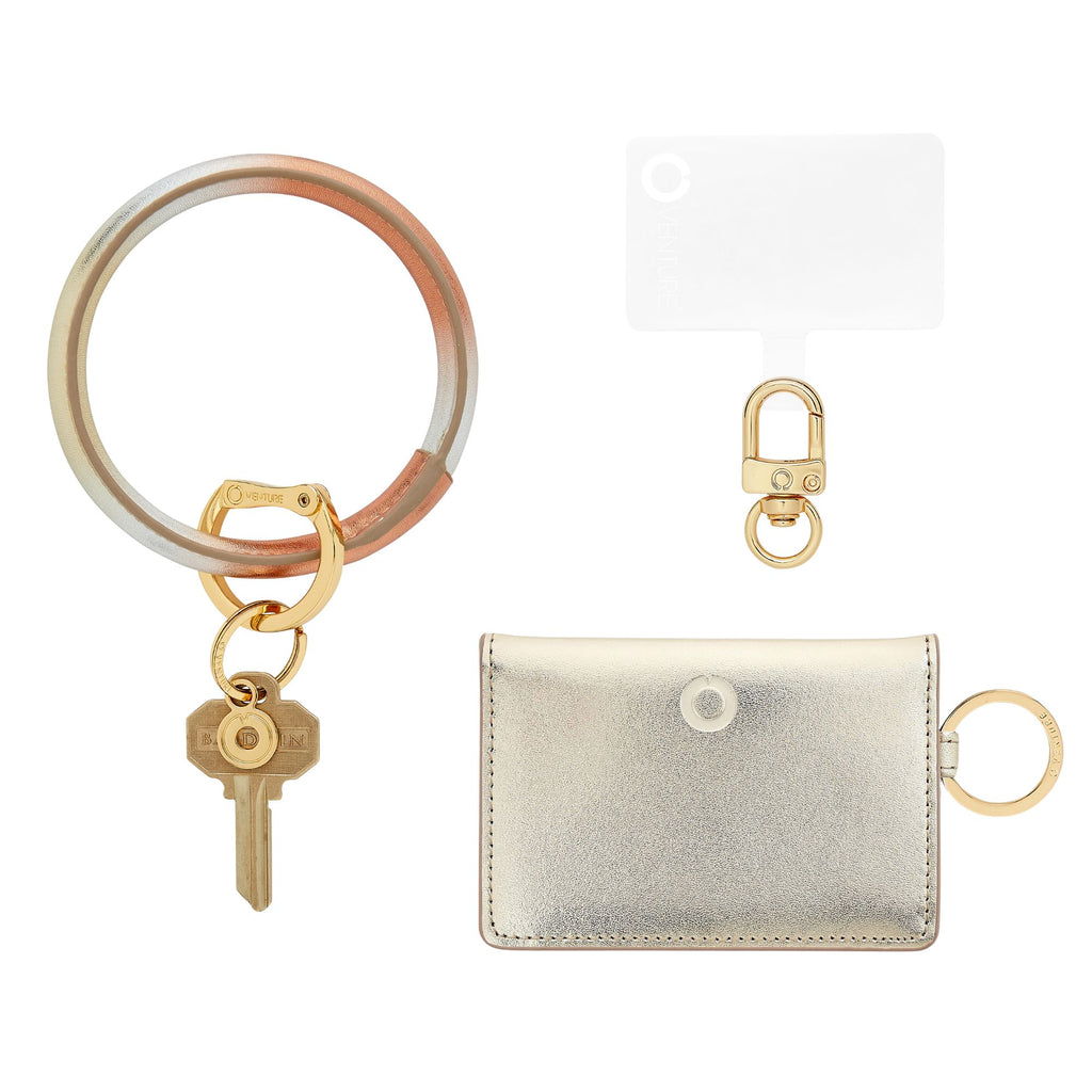 Mixed Metal Big O Keyring that goes from gold to rose gold to silver.  Gold id case  and phone connector included by Oventure