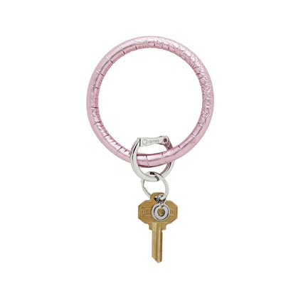 Metallic Pink Leather Croc Embossed Big O Key Ring with silver locking clasp shown on wrist