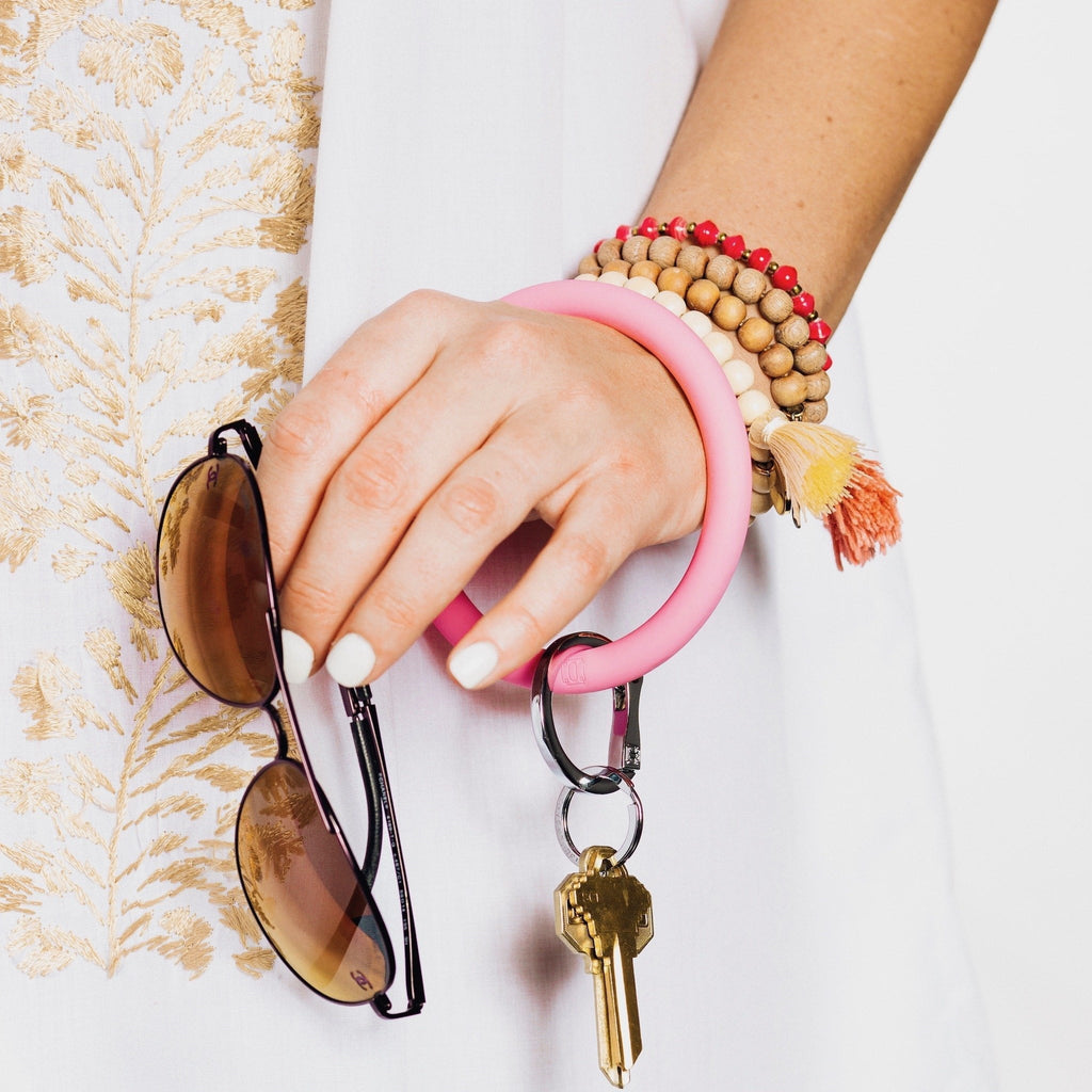 Cotton Candy - Silicone Big O Key Ring - Oventure worn above the wrist holding sunglasses