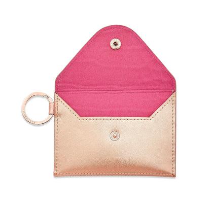 Stylish leather keychain wallet in mini envelope design.  Keyring wallet is shown open with pink liner.
