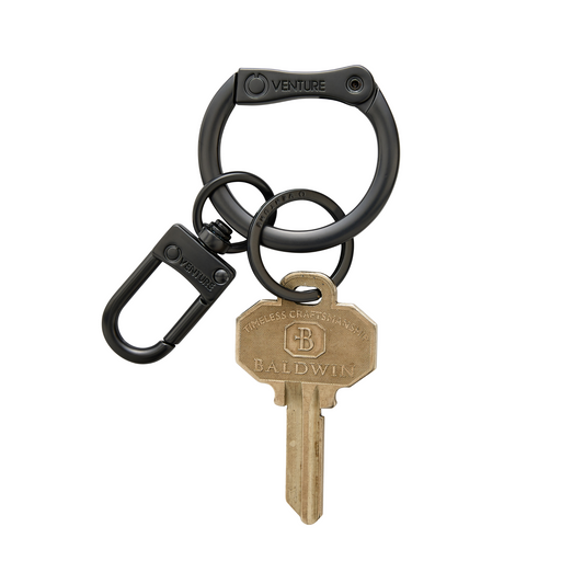 o-bOy key chain in matte black. Can hold keys and attach to belt loop