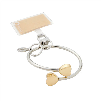 Stylish Big O Phone Bracelet for Hands-Free Convenience in silver with gold hearts.