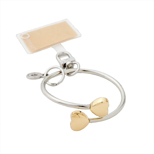 Stylish Big O Phone Bracelet for Hands-Free Convenience in silver with gold hearts.