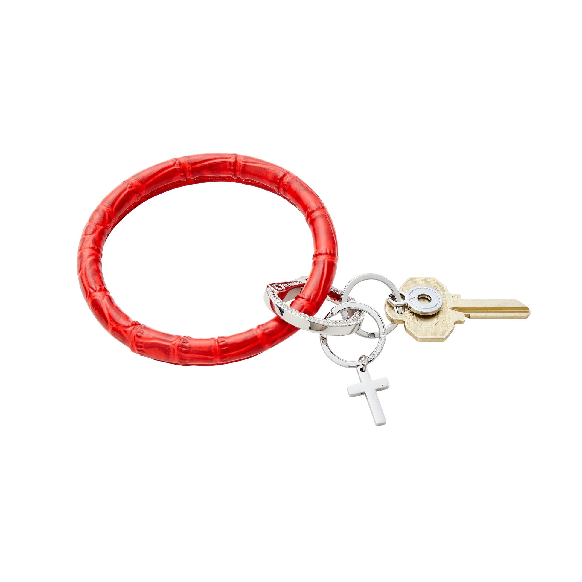 Cross charm in silver on a split ring. This can be attached to a Big O Key Ring. Featured is a red croc big o in embossed leather.