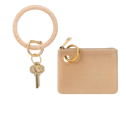 Shop the Gold Rush Confetti Mini Pouch Wristlet, a stylish and functional accessory made of smooth silicone.