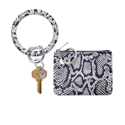 Pouch wristlet in smooth silicone for style.