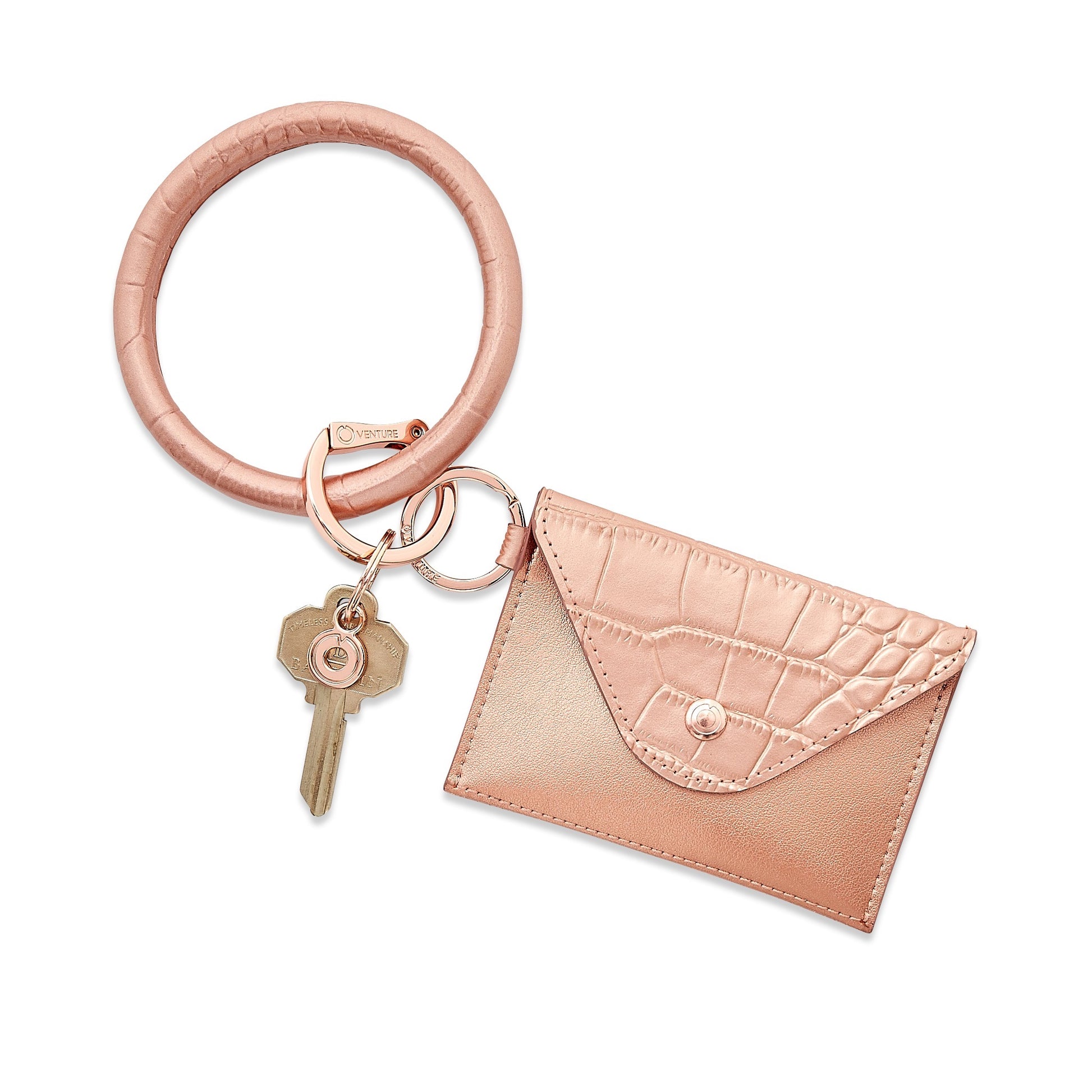Stylish leather keychain wallet in mini envelope design shown with key ring bracelet in rose gold.