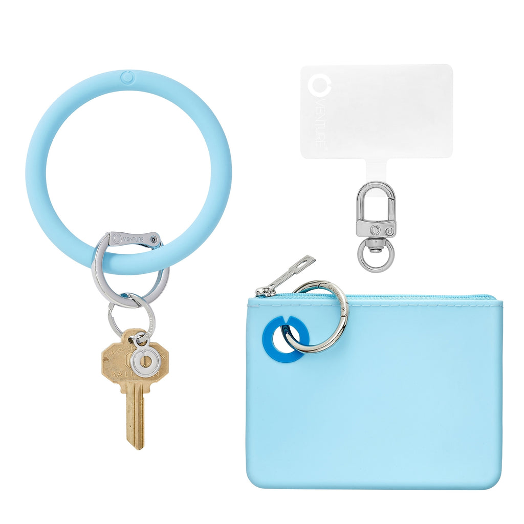 Three in one set of Big O Keyring Mini silicone pouch in sweet Carolina blue and hook me up phone connector with silver hardware