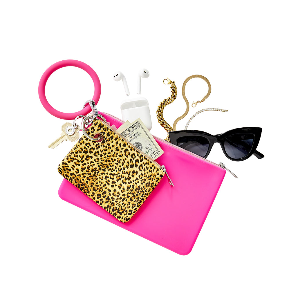 Cheetah - Mini Silicone Pouch by Oventure layered with the pink silicone pouch. Pouch can hold air pods, sunglasses and cash