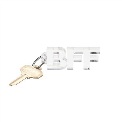 Celebrate friendship with the BFF Acrylic Keychain! This clear acrylic keychain spells out "BFF" in a chic design, perfect for gifting or accessorizing.