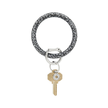Black background with silver metallic cheetah print silicone big o key ring with silver locking clasp
