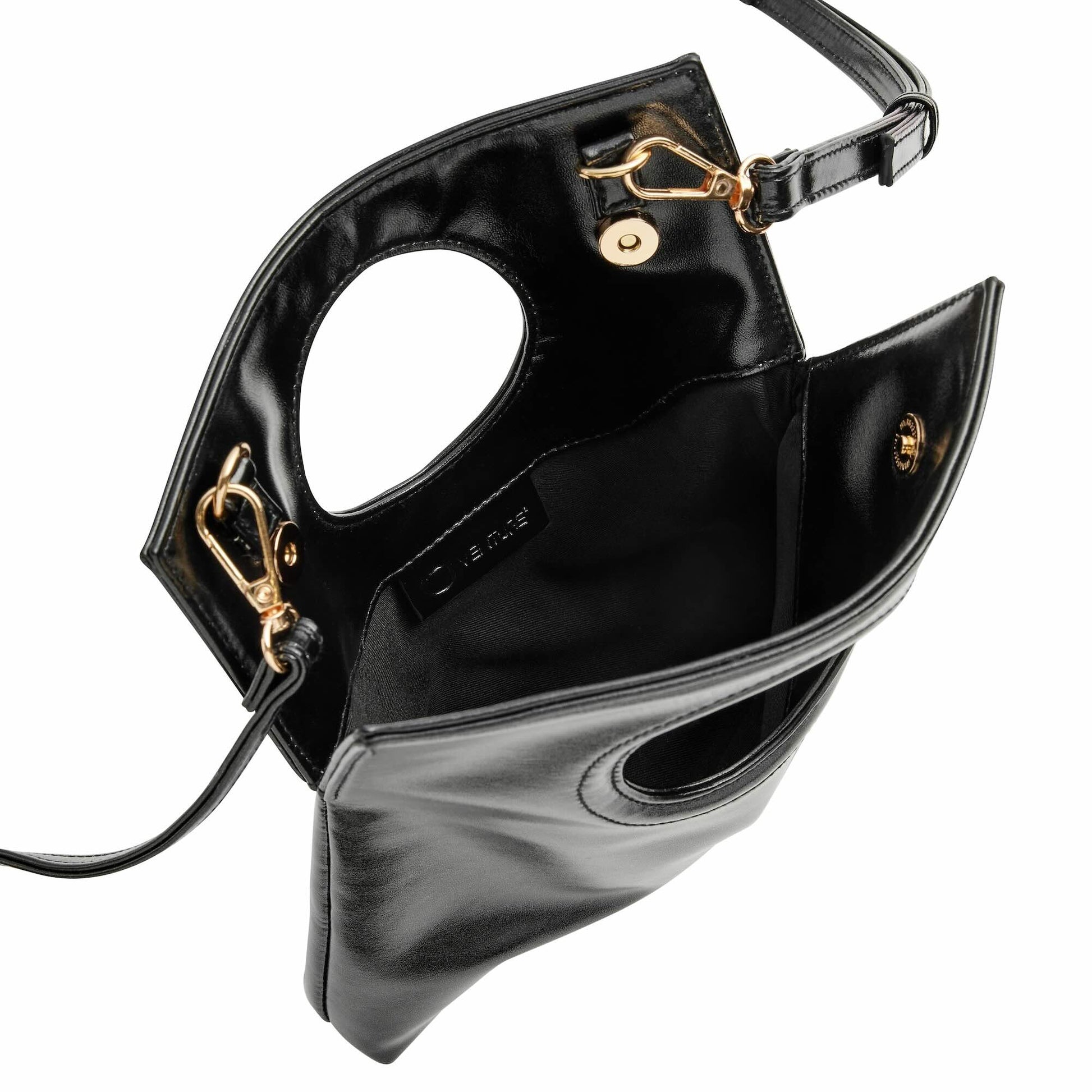 Black handbag with gold hardware on a white background
