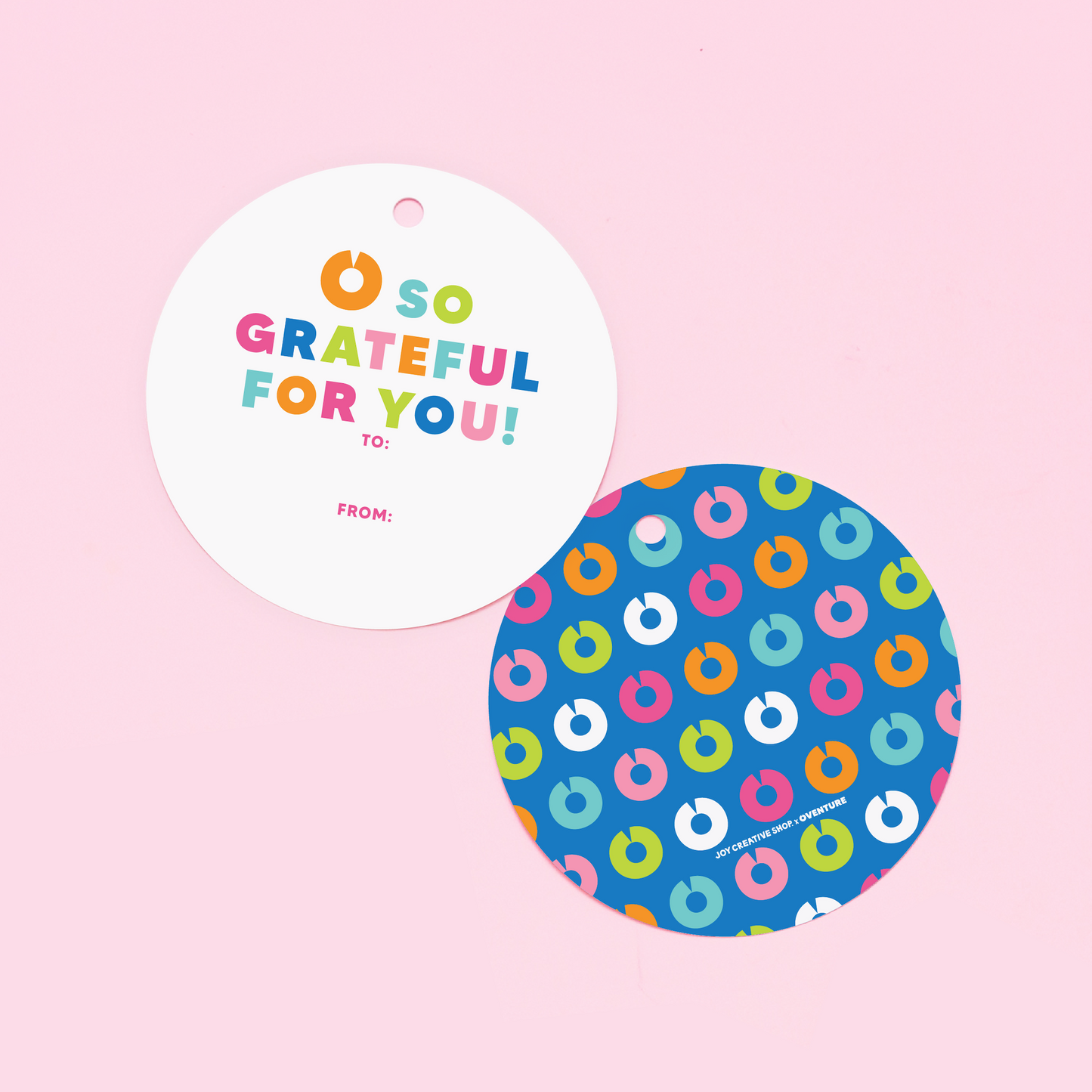 Colorful gift tag with the printed message "O so grateful for you" in a fun, bold font, attached to a wrapped present