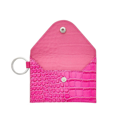 Stylish leather keychain wallet in mini envelope design with hot pink micro fiber lining showing open.