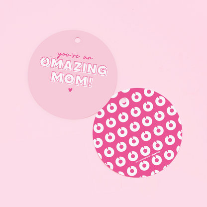 Colorful gift tag with the cheerful printed message "Omazing Mom" in a playful font, perfect for celebrating Mother's Day or a special mom moment.