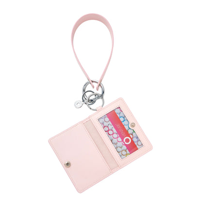 Stylish wristlet wallet in pale pink leather includes id case and leather keyring loop shown open