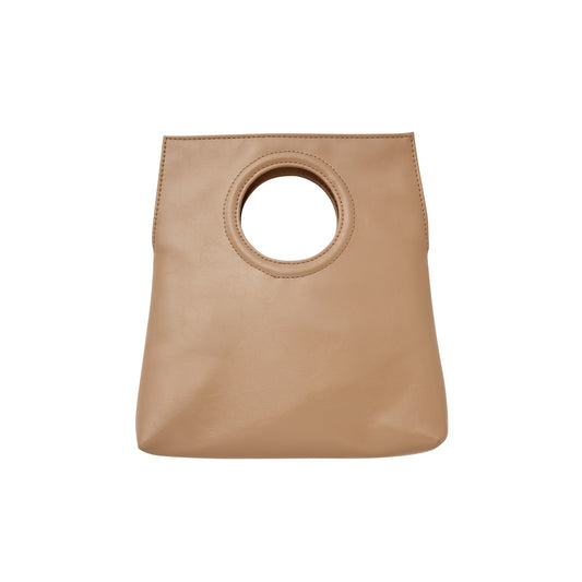 A taupe crossbody bag with a circular handle cutout, crafted from vegan leather, displayed against a plain background.
