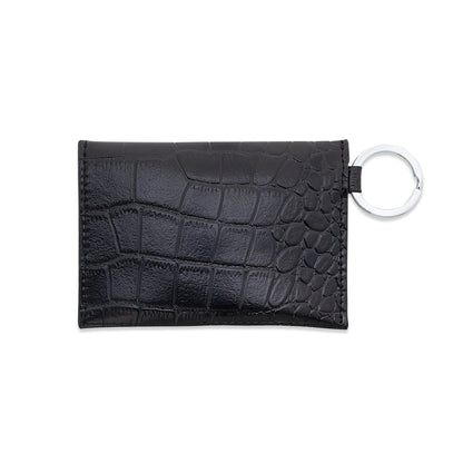 Stylish leather keychain wallet in mini envelope design shown backside.