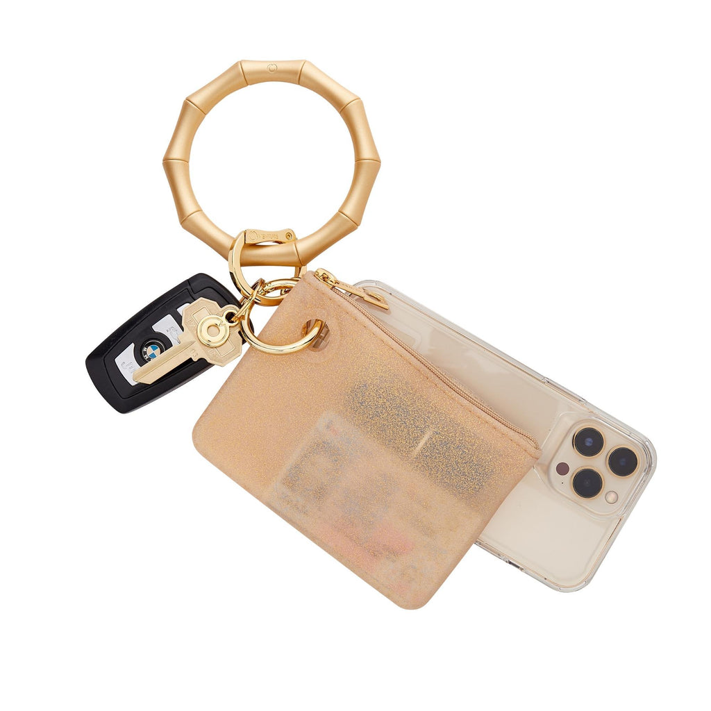 Gold Rush Confetti - Mini Silicone Pouch - Oventure shown attached to the Big O Key Ring in gold silicone Bamboo and phone attached with phone connector